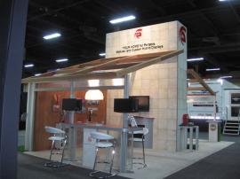 RENTAL Exhibit:  20 x 30 Island Exhibit with 16 ft Tower, Ceiling Structure, and (6) Workstations -- Image 1