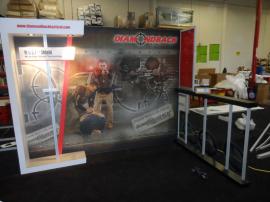 Custom SEGUE Hybrid Display with Large Format Graphics and Custom Counter with Locking Storage -- Image 1