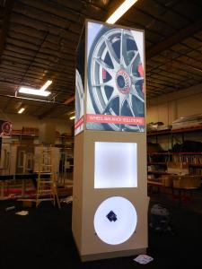 Custom Tower with Backlit Product Displays and Silicone Edge Graphics