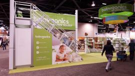 RENTAL:  Modified RE-9020 Double-Deck with Counters, Product Displays, Graphics, and an Overhead Hanging Sign -- Image 4
