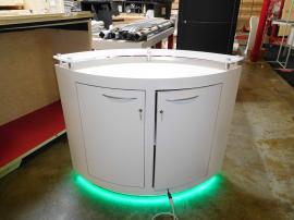 Custom Lens-shaped Counter with LED Lights and Locking Storage