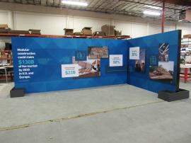 Custom Island Exhibit with SuperNova Lightboxes, SEG Tension Fabric Graphics, Product Shelves, Locking Storage, Monitor Mount, and Planter Boxes