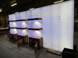 Custom Island Exhibit with SuperNova Lightboxes, SEG Tension Fabric Graphics, Product Shelves, Locking Storage, Monitor Mount, and Planter Boxes