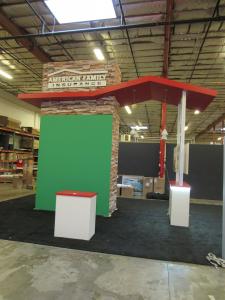 Custom Gravitee Tower with Tension Fabric Graphics, Roof Canopy, Reception Counters, Standoff Graphics, Large Monitor Mount, and Pendant Lights