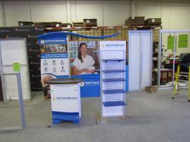 VK-1901 Portable Hybrid Display with Tension Fabric and Direct Print Graphics, SYM-406 Counter with Locking Storage, and Slatwall Tower with 5 Adjustable Shelves