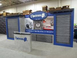 Custom Inline with Laminated Slatwall, Puck Lights, LED Lightbox with Fabric Graphic, Dimensional Sign, and Custom Reception Counter with Storage